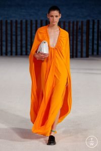 Bright orange dress during the Proenza Schouler spring/summer 2022 runway