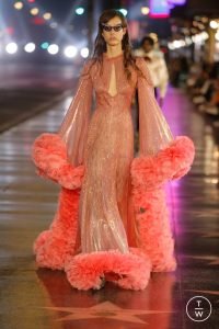 Pink sparkly extravagant dress during the Gucci spring/summer 2022 runway