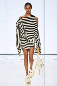 Black and white striped dress during the Balmain spring/summer 2022 runway